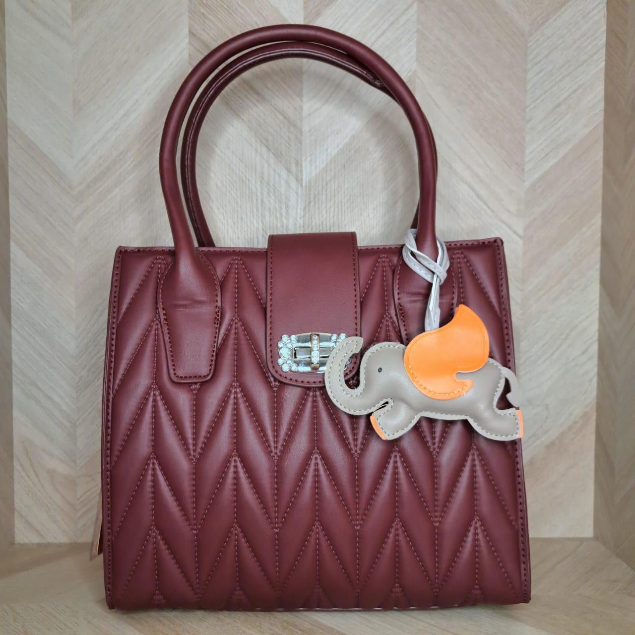 CBM Bolsa Mano Mediana Dije Elefante