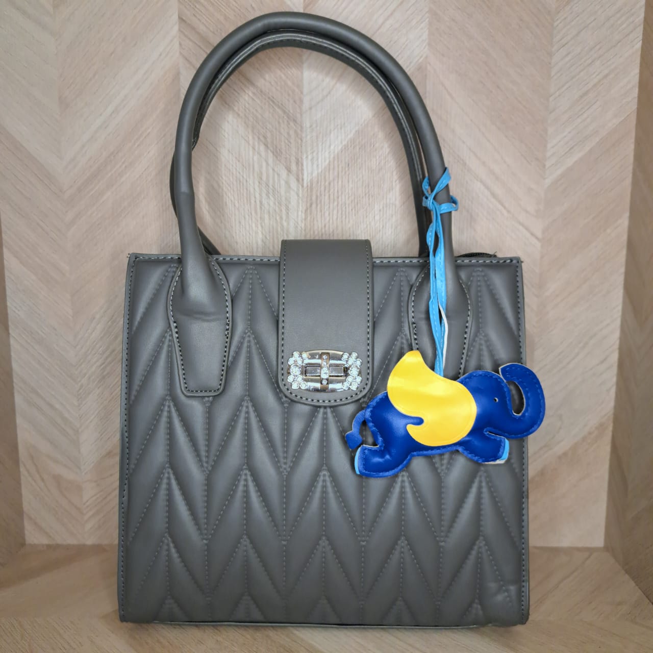CBM Bolsa Mano Mediana Dije Elefante